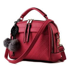 Elegant ladies' luxury leather handbag by Mandotos featuring sleek design and high-quality craftsmanship.