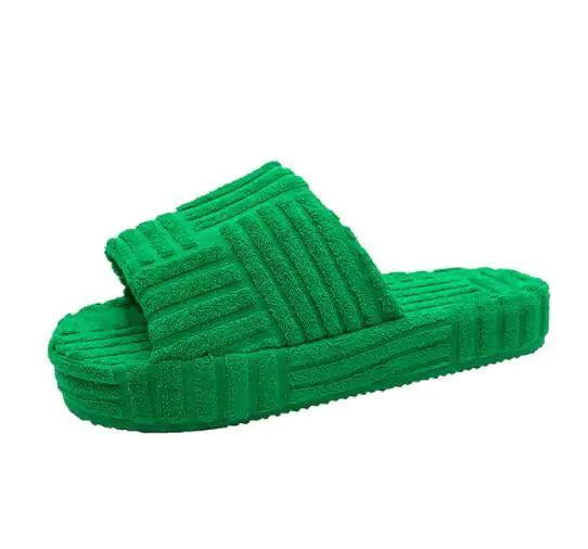 Comfortable ladies' plush slip-on slippers by MANDOTOS with soft, cozy fabric and slip-on design for indoor wear.