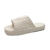 Comfortable ladies' plush slip-on slippers by MANDOTOS with soft, cozy fabric and easy wear design.