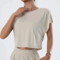 Ladies' Summer Breeze Tee from MANDOTOS, lightweight cotton top with short sleeves, featuring a relaxed fit and soft pastel color.