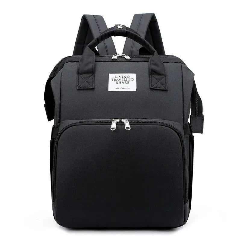 Large-capacity MANDOTOS mommy bag with multiple compartments and adjustable straps, designed for moms on the go.