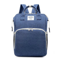 Large-capacity Mommy Bag by MANDOTOS with multiple compartments and sturdy handles, designed for organized parent travel.