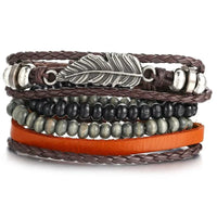 Layered leather charm bracelet by MANDOTOS featuring multiple leather strands and metal charms, stylish and casual accessory.