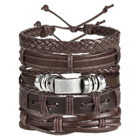 Layered leather charm bracelet by MANDOTOS featuring multiple leather bands and metal charms on a neutral background.