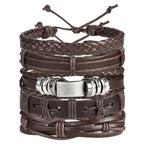 Layered leather charm bracelet by MANDOTOS featuring multiple leather bands and metal charms on a neutral background.