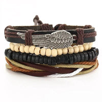 Mandotos layered leather charm bracelet with metal and leather accents, featuring multiple strands and decorative charms.