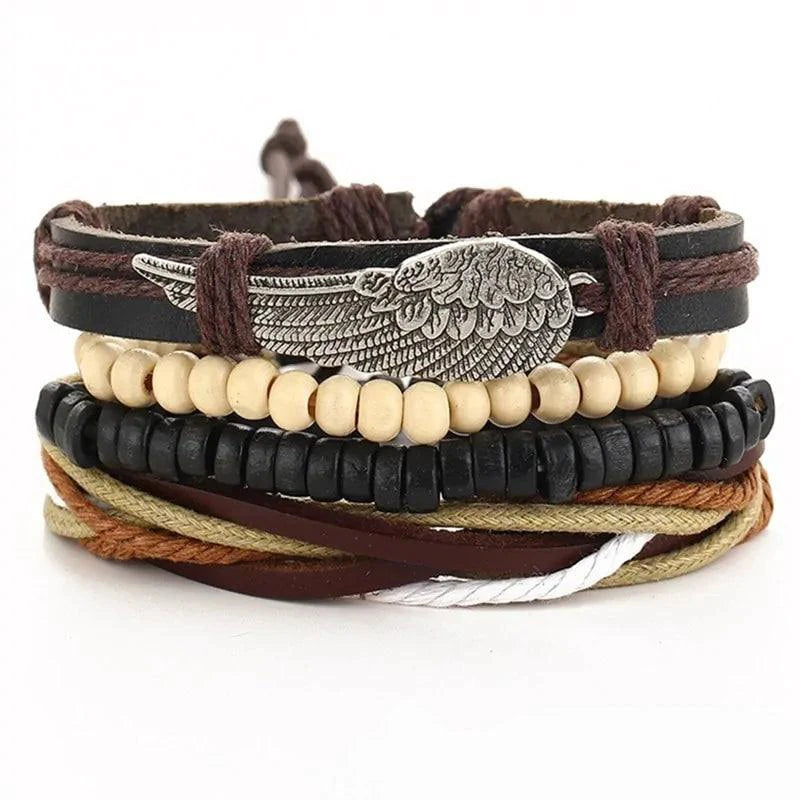 Layered leather charm bracelet by MANDOTOS featuring multiple leather strands and decorative metal charms.