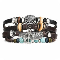 Mandotos layered leather charm bracelet with multiple leather strands and metal charms, stylish accessory for casual wear.