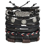 Layered leather charm bracelet by MANDOTOS featuring multiple leather strands and metal charms on a neutral background.