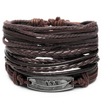 Mandotos layered leather charm bracelet with metal and leather accents, featuring multiple strands and decorative charms.