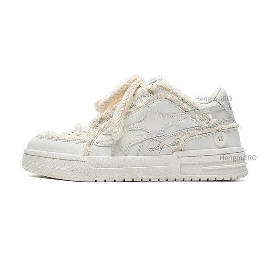 Mandotos leather casual sneakers with white soles and sleek design, ideal for everyday wear and stylish comfort.