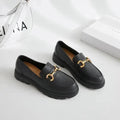 Pair of women's MANDOTOS loafers featuring classic slip-on style and sleek design, perfect for casual or office wear.