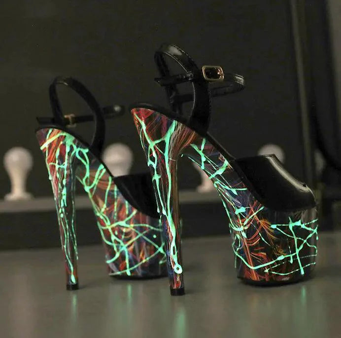 Mandotos lustrous leather stilettos with pointed toes and sleek heel, showcasing elegant footwear design.