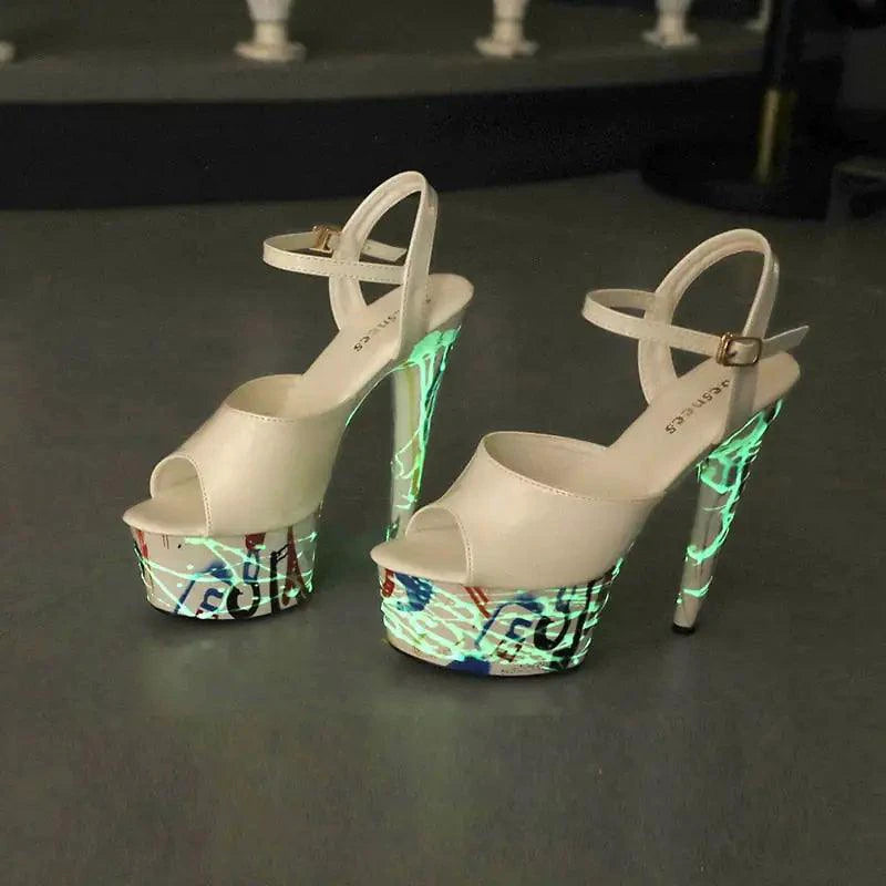 Mandotos lustrous leather stilettos with pointed toes and sleek high heels, showcasing shiny finish and elegant design.