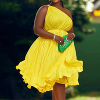 Mandotos Luxe Couture ruffle midi dress with flowing pleats, featuring elegant design and lightweight fabric for a sophisticated look.