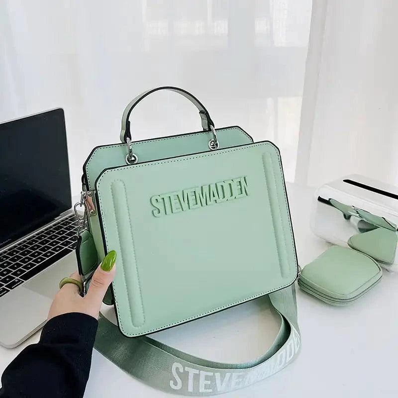 Mandotos Luxe women's shoulder purse with sleek design, featuring a stylish strap and elegant exterior in neutral tones.