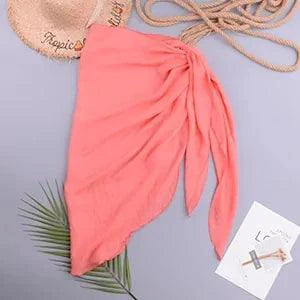 Mandotos LuxeWave chiffon beach wrap draped over a model, showcasing its lightweight, elegant, and versatile cover-up for all-day style.