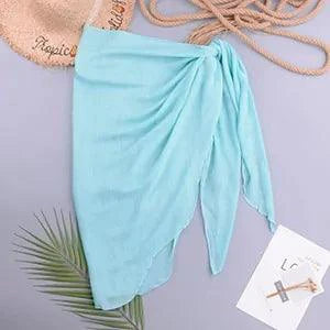 Mandotos LuxeWave chiffon beach wrap draped over a model, showcasing its lightweight, chic, and versatile design for all-day style.