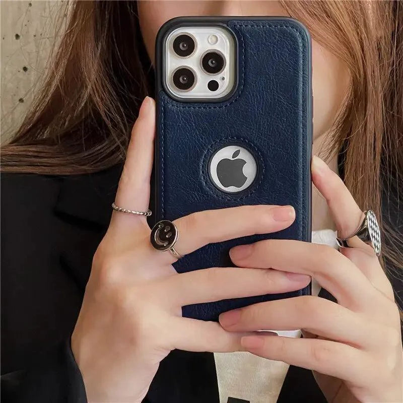 Luxurious black leather sleeve by MANDOTOS, featuring smooth texture and sleek design for stylish protection.