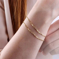 Handcrafted luxury gold chain bracelet by MANDOTOS featuring intricate link design and polished finish.