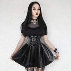 Mandotos black leather lace-up skirt with front lacing detail, form-fitting design, and sleek finish, perfect for stylish outfits.