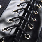 Mandotos black leather lace-up skirt with front lacing detail, fitted style, and high waist, perfect for edgy fashion looks.