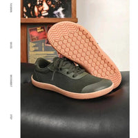 Mandotos men's breathable wide toe mesh running shoes with lightweight responsive sole for comfort and support during workouts.