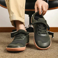 Mandotos men's breathable wide toe mesh running shoes with lightweight responsive sole for comfort and support during exercise.