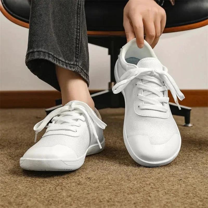 Mandotos men's breathable wide toe mesh running shoes with lightweight responsive sole, designed for comfort and support during exercise.