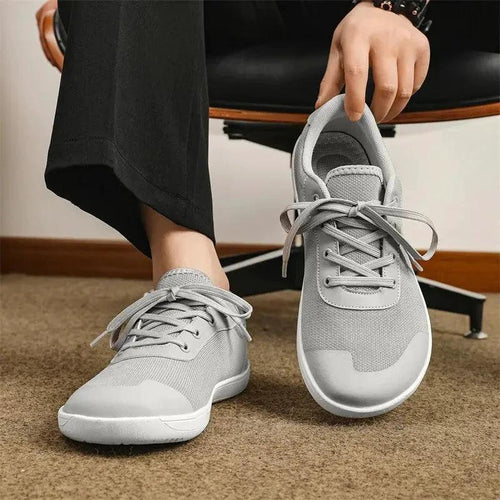 Mandotos men's breathable wide toe mesh running shoes with lightweight responsive sole for comfort and support during exercise