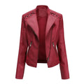 Mandotos chic feminine black leather coat with zipper pockets and biker-style details, stylish outerwear for women.