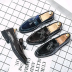 Blue Mandotos men's leather loafers with a college-inspired design, handcrafted dress shoes featuring premium craftsmanship.