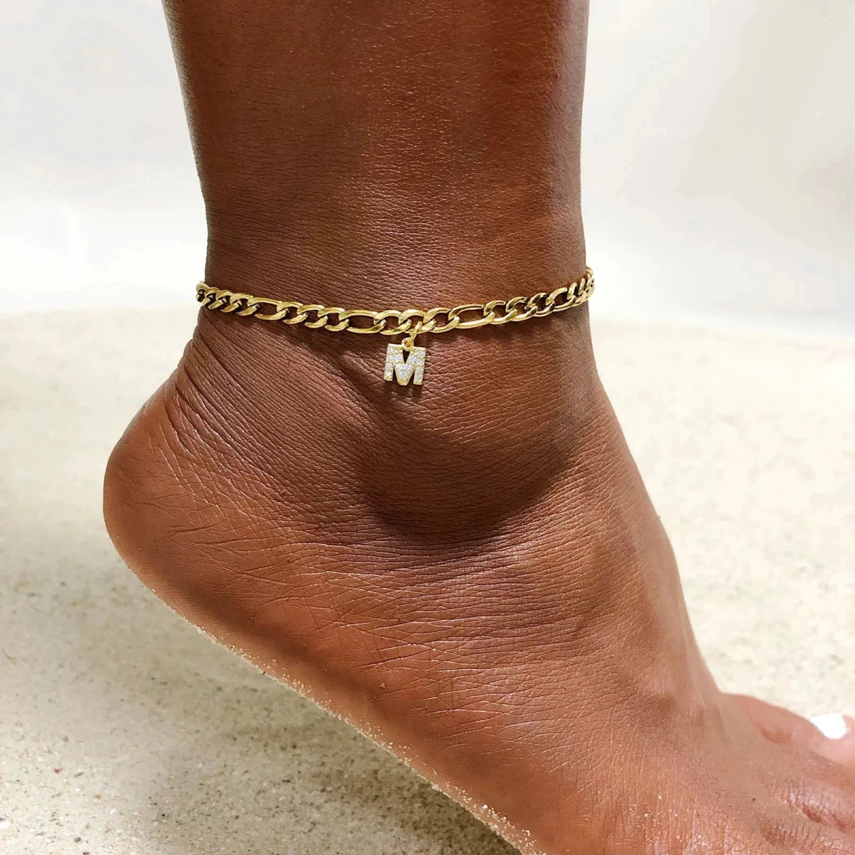 Mandotos crystal A-Z letter initial anklet for women with Cuban link stainless steel chain, beach-ready design.