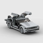 Mandotos DeLorean time travel set with 214 gray building pieces, featuring detailed car model and accessories for imaginative play.