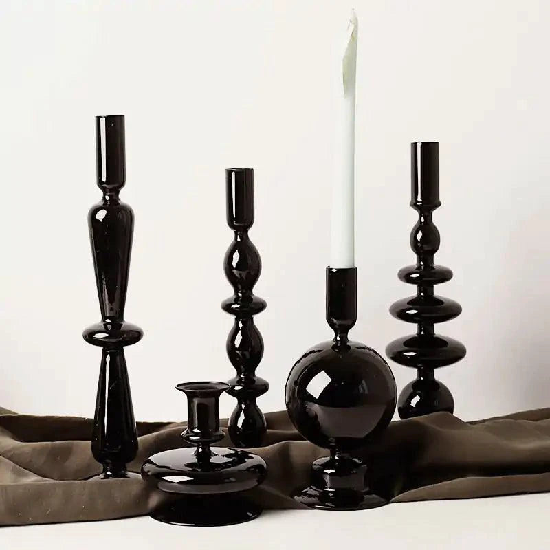 Mandotos Elegant Rue black glass candlestick holder on table, stylish centerpiece for home decor and gift ideas