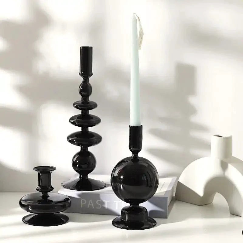 Mandotos black glass candlestick holder with elegant Rue design, perfect as table decor or a stylish gift centerpiece.