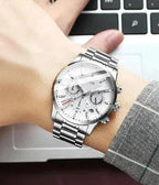 Mandotos men's sport quartz watch with black dial and silver band, stylish men's fashion watch for active wear.