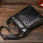 Men's messenger bag by MANDOTOS with adjustable shoulder strap and multiple compartments for everyday convenience.