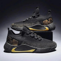 Men's athletic trainer shoes by MANDOTOS featuring breathable mesh uppers and cushioned soles for active wear.