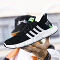 Men's breathable mesh sports shoes by MANDOTOS with flying weave upper and lightweight design for athletic comfort