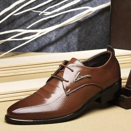 Men's casual leather shoes by MANDOTOS featuring brown leather, stylish design, and comfortable fit.