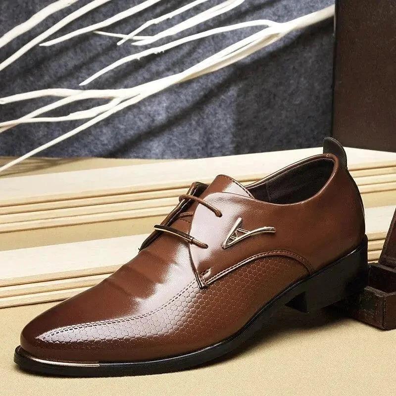 Men's casual leather shoes by MANDOTOS featuring brown leather uppers and comfortable slip-on design.