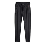 Men's casual straight slim fit jogger pants in blue, black, or gray with elastic waist from MANDOTOS, plus size available.