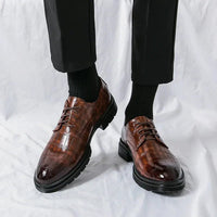 Men's elegant breathable tassel loafers by MANDOTOS, featuring sleek design and comfortable fit, shown in a stylish close-up image.