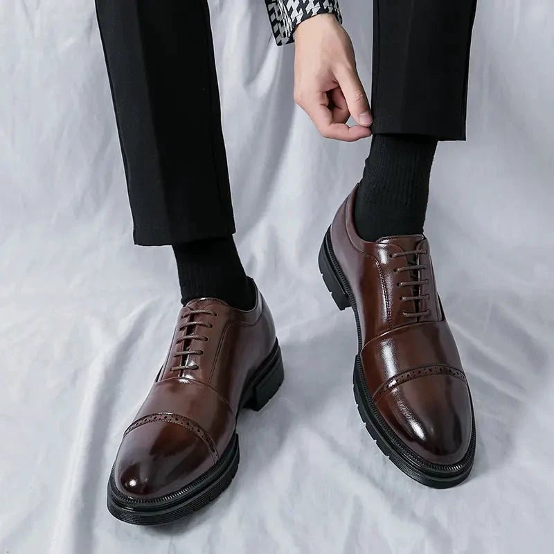 Men's elegant breathable tassel loafers by MANDOTOS, featuring sleek design and comfortable fit, perfect for stylish occasions.