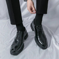 Men's elegant breathable tassel loafers by MANDOTOS, featuring sleek design and comfortable leather construction.