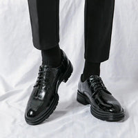 Men's elegant breathable tassel loafers by MANDOTOS, featuring sleek design and soft leather material.