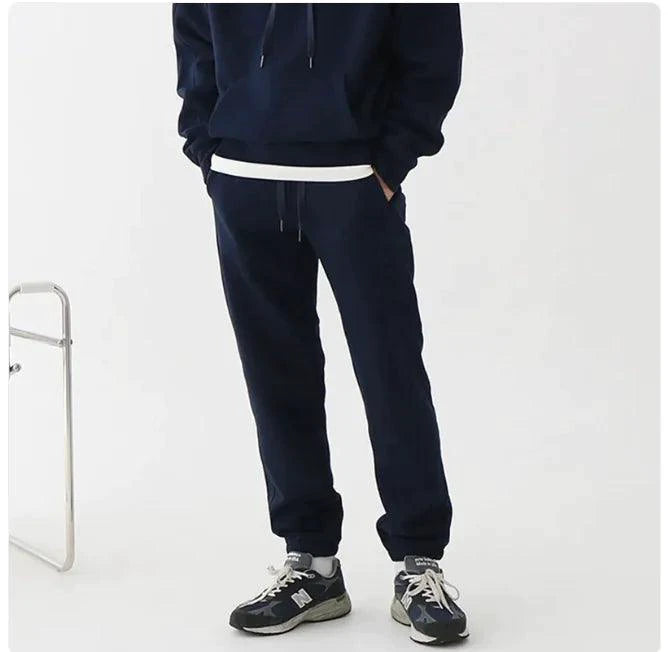 Men's hooded sports sweatshirt by MANDOTOS, featuring a comfortable fit and casual style, shown in a front view.
