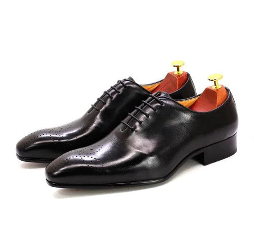 Men's black leather Oxford shoes by MANDOTOS, featuring sleek design and polished finish, perfect for formal or business wear.