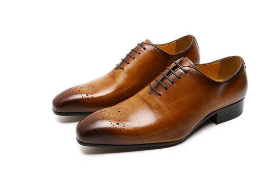 Men's leather Oxford shoes by MANDOTOS featuring classic design, polished finish, and lace-up style for formal occasions.